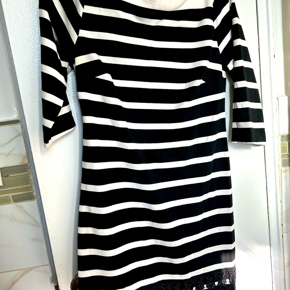 Black and white thick winter dress with beautiful lace ending at the bottom